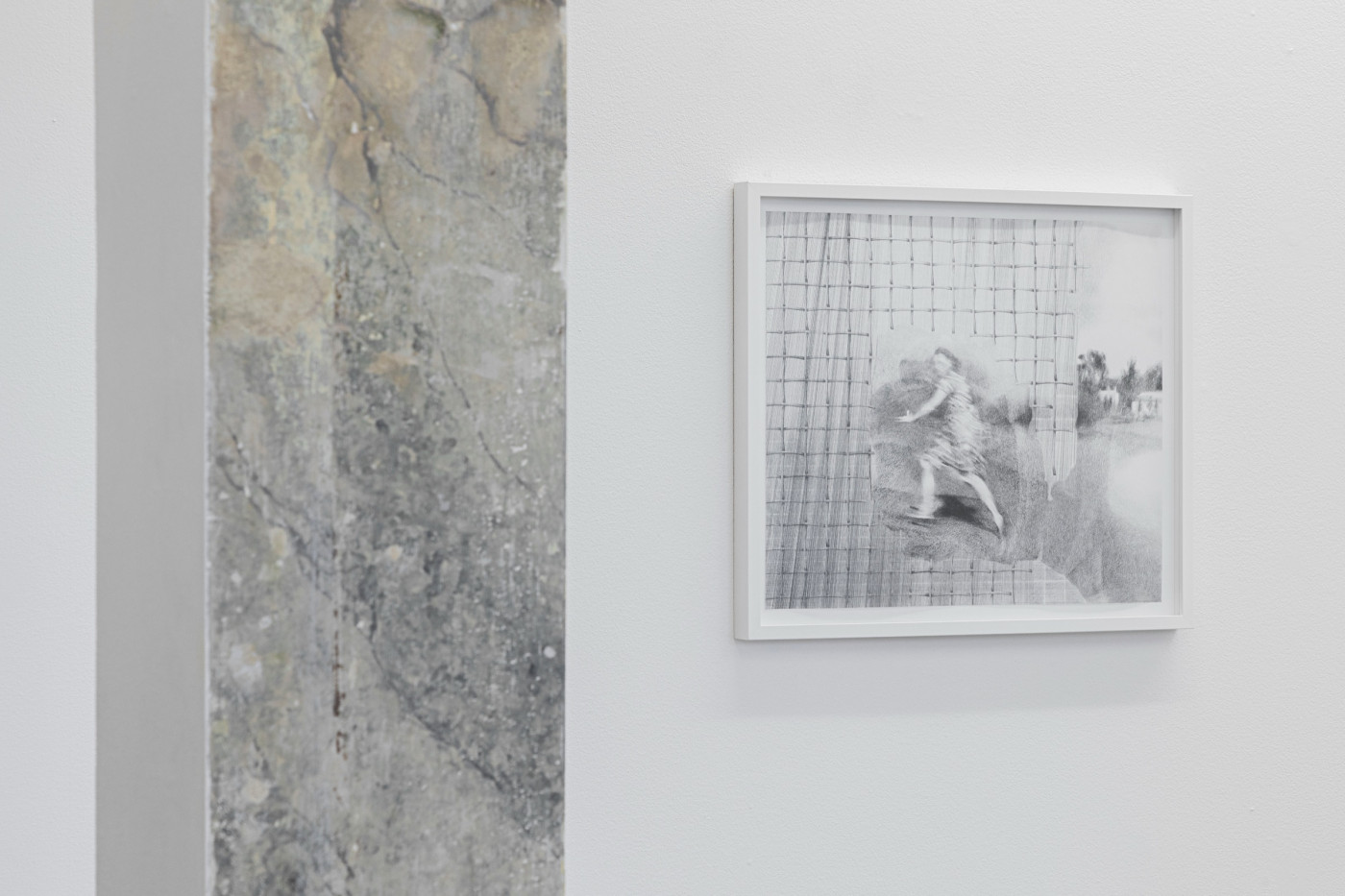 Expanded metal column and framed drawing