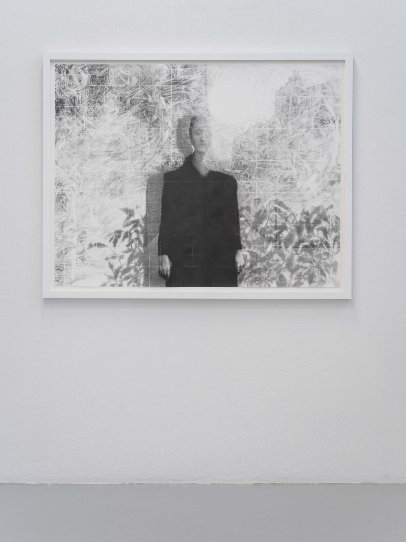 Framed drawing on a white wall
