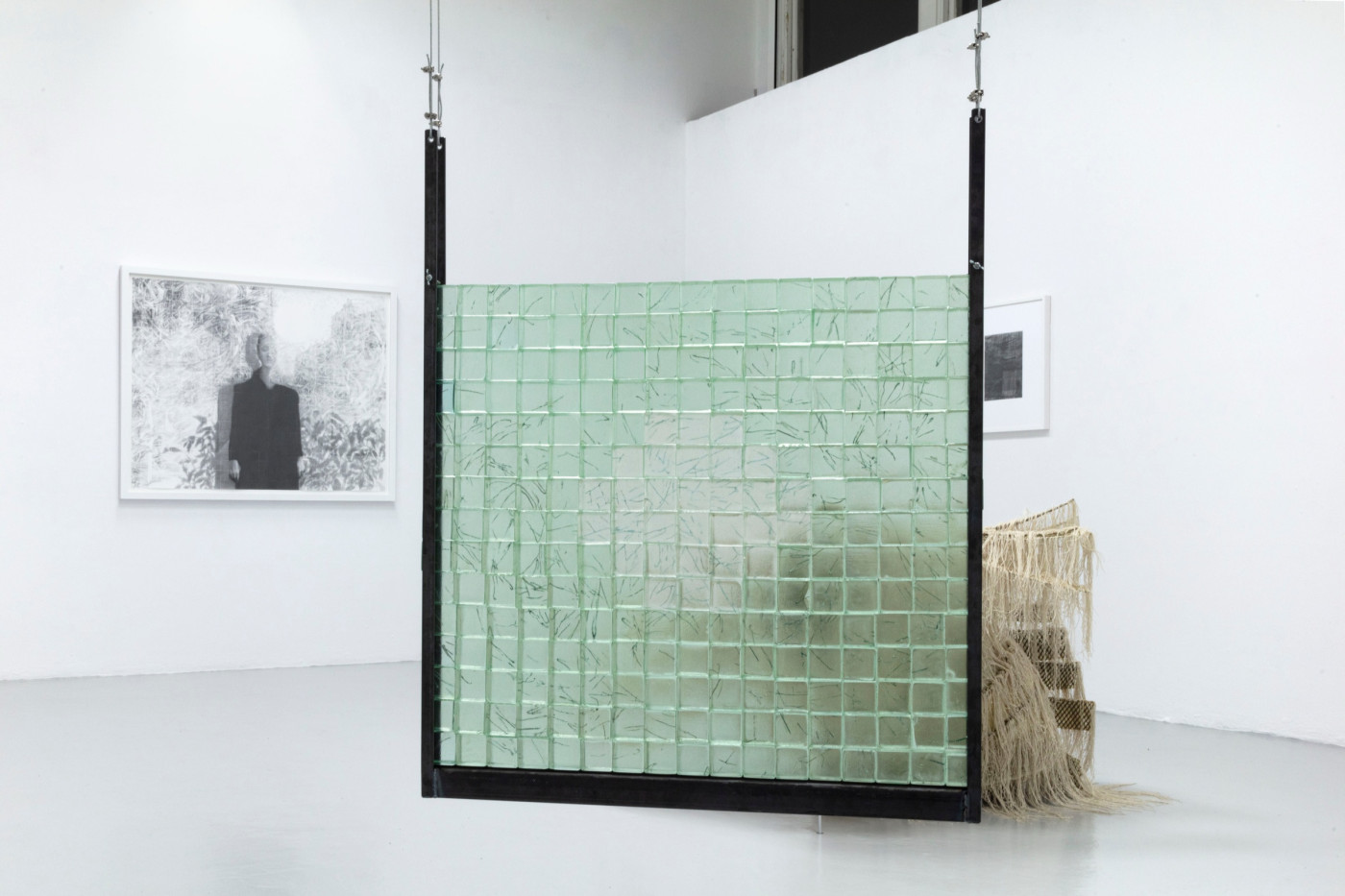 Green grid panel suspended in the gallery