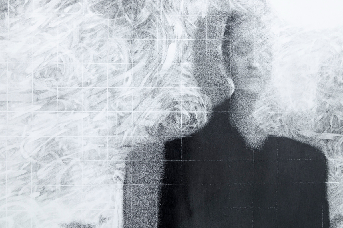 Drawing of a figure behind a grid